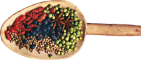Photo of a wooden spice shovel with colorful spices on it. | © SONNENTOR