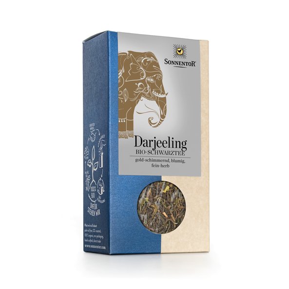Photo of a pack of SONNENTOR Darjeeling black tea loose. An elaborate illustration of an elephant is featured on the package.