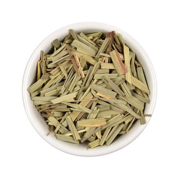 Photo of a small, white bowl filled with loose lemongrass from SONNENTOR