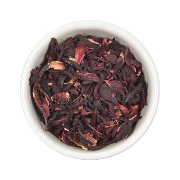 Photo of a small, white bowl filled with loose hibiscus from SONNENTOR