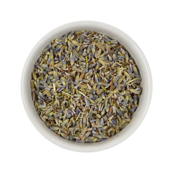 Photo of a small, white bowl filled with loose SONNENTOR lavender flowers