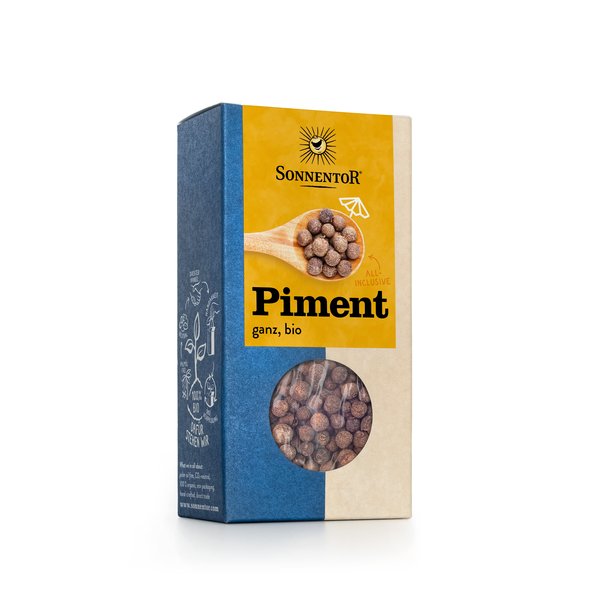Photo of a pack allspice. On the package you can see a wooden spoon with allspice on it.