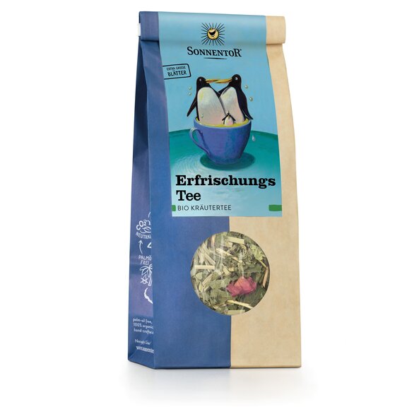 Photo of a pack Refreshing Herbal Tea loose. On the package is a picture of two large penguins and a small penguin bathing in a cup.