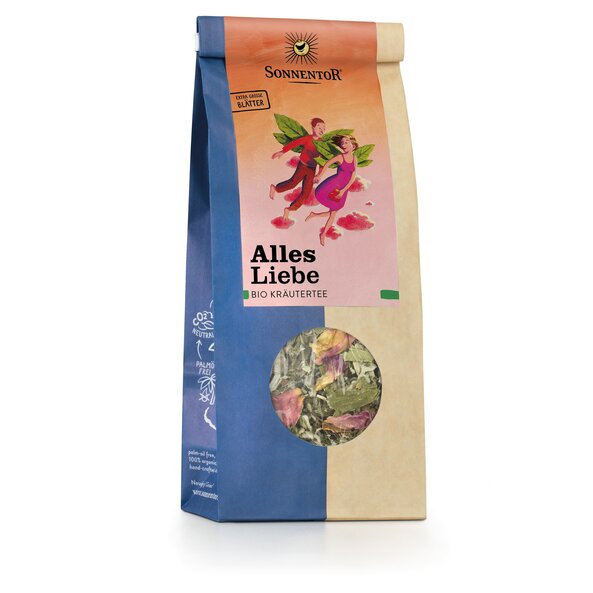 Photo of a pack All the Best Herbal Tea loose. On the package is a picture of a man and a woman with wings made of leaves fly next to each other hand in hand with the woman holding a heart in her hands.