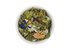 Photo of a small bowl filled with the loose Pleasant Leisure Time Herbal Tea from SONNENTOR.