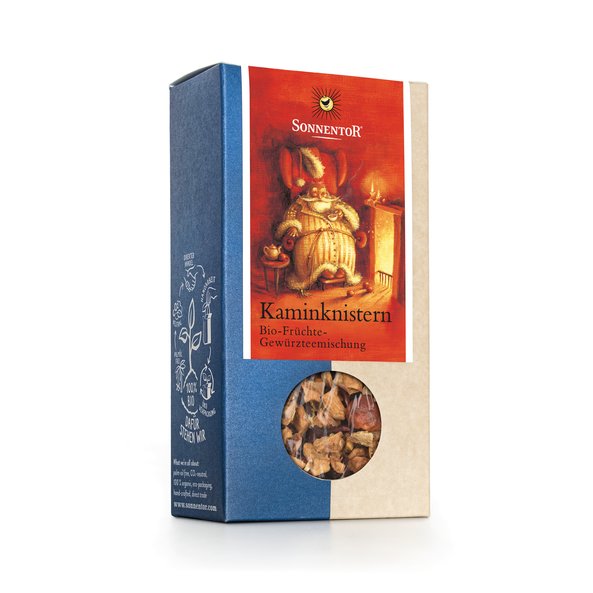 Photo of a pack Fireplace Fruit Tea loose Organic Fruit Spice Tea Blend. On the package is an Illustration of an old man sitting in a chair in front of the fireplace and drinking a cup of tea.