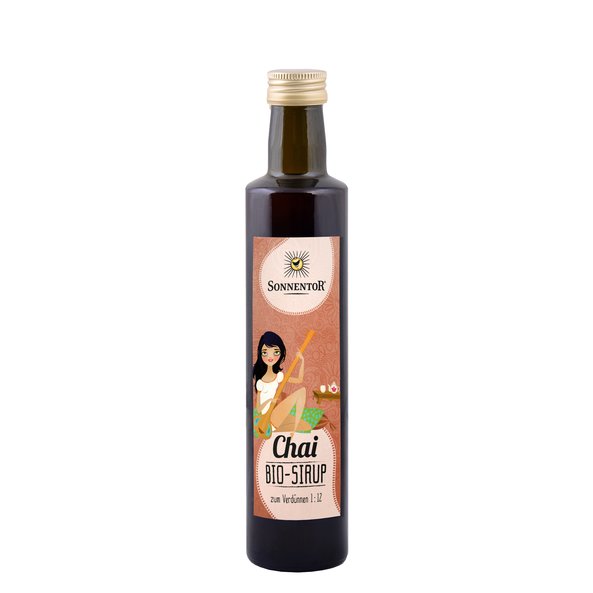 Photo of a bottle chai syrup. On the bottle you can see a young woman. 