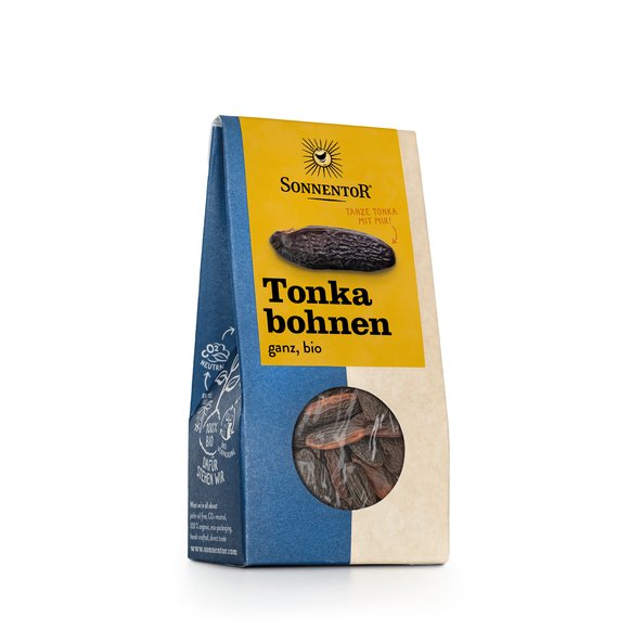Photo of a pack tonka beans. On the package is a yellow label on which you can see a tonka bean.