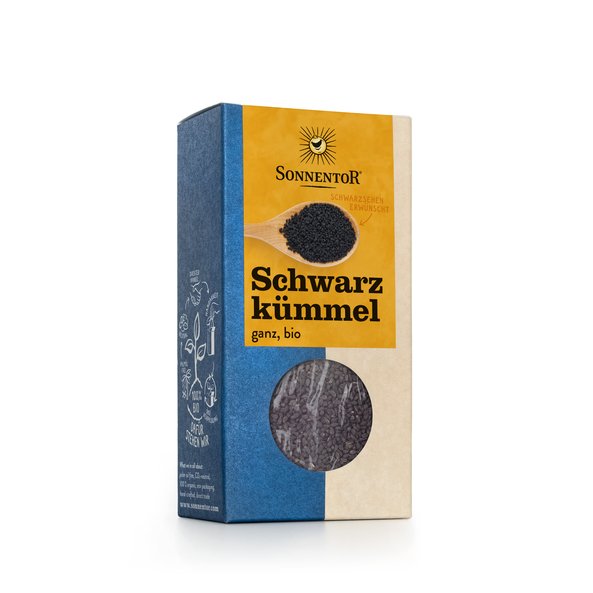 Photo of a pack black cumin whole. On the package you can see a spoon with black cumin on it.