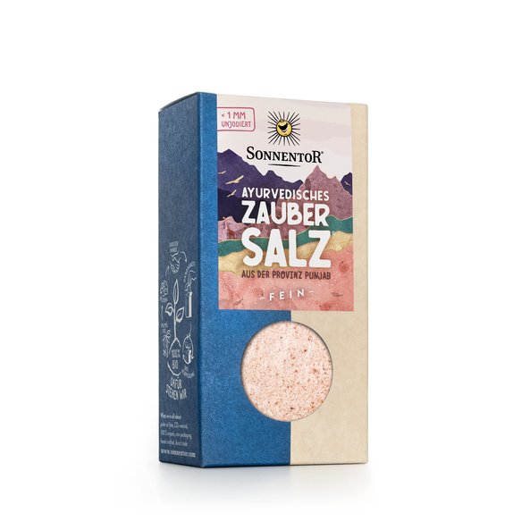 Photo of a pack Ayurvedic magic salt. On the package you can see mountains in various colors.