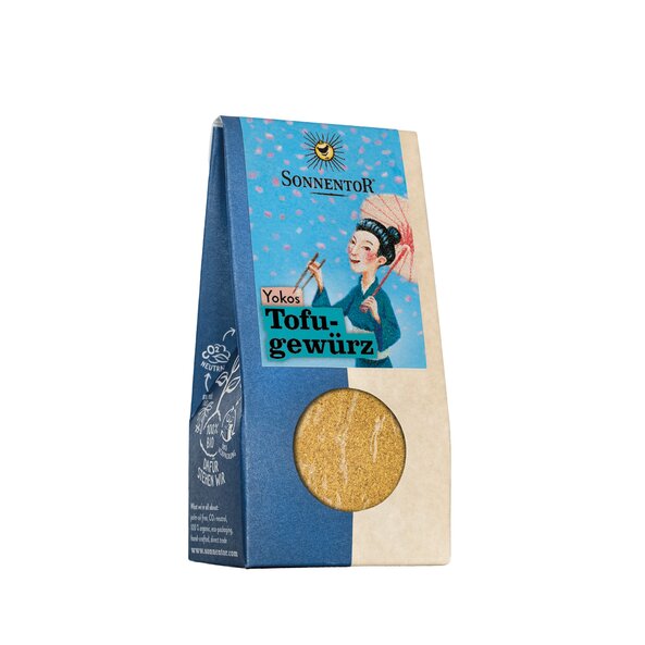 Photo of a pack Yoko's Tofu Spice Mix. On the package you can see a lady with an umbrella and two sticks in her hand.