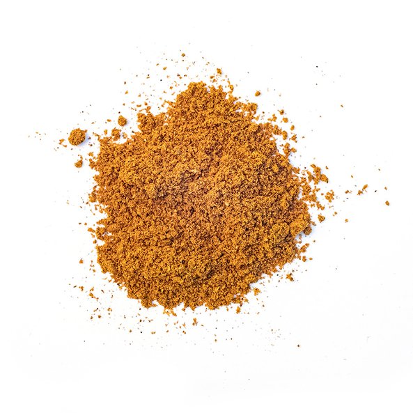 Photo of orange colored Ras el Hanout spice.