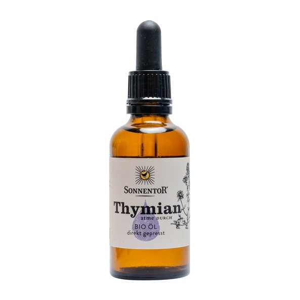 Photo of a bottle thyme oil. On the bottle is thyme and a purple drop of oil. 