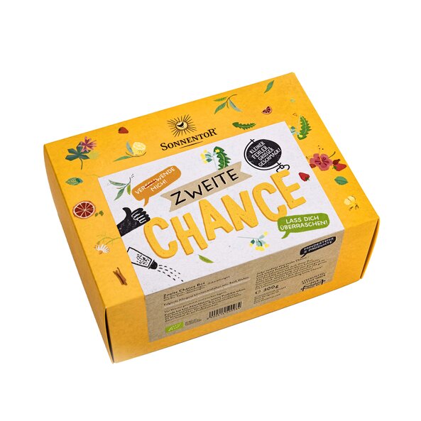 A photo of the Second Chance Box. The box is yellow and decorated with various herbs.