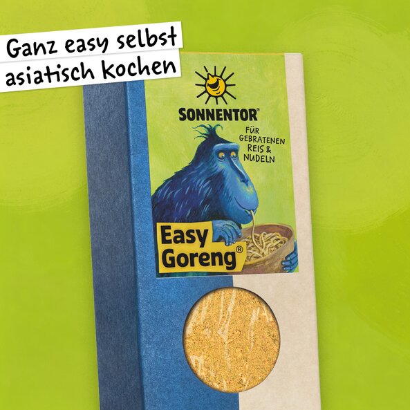 Easy Goreng spice in a pack with a window and illustration with the words: ‘Easy Asian cooking at home’ and a blue monkey eating noodles from a key on a light green background. | © SONNENTOR