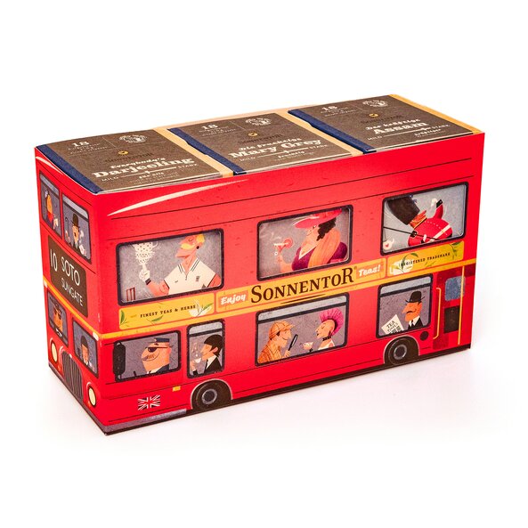 The characters of our new black tea line look out the windows of the red London bus.