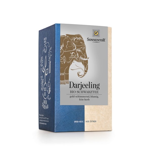 Photo of a pack of Darjeeling black tea Organic Black Tea. On the package is an elephant’s head in the color gold.