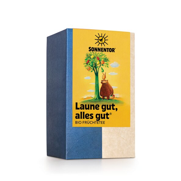 Foto einer Packung Laune gut, alles gut Früchtetee. Auf der Packung ist eine Abbildung von einem Bären, der einem Korb in der Hand hält und einen Igel auf dem Kopf trägt, der Früchte von einem Baum pflückt.