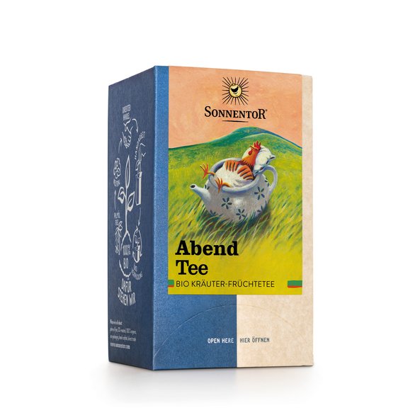 Photo of a pack Evening Tea Organic Herbal Fruit Tea. On the package is a picture of a meadow with a teapot in which a sleeping chicken is lying.