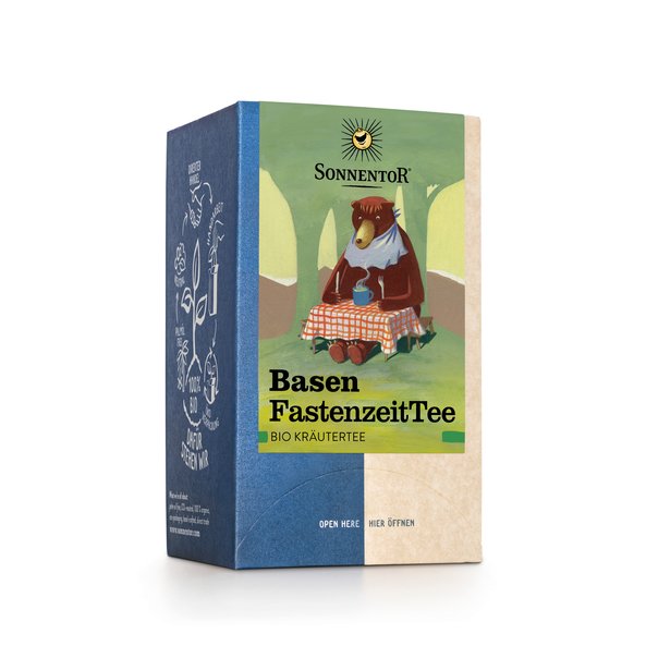 Photo of a pack Base FastingTea Organic Herbal Tea. On the package is a picture of a bear sitting at a table in the woods, holding a knife and fork in his hand and and having a cup of hot tea in front of him at the table.