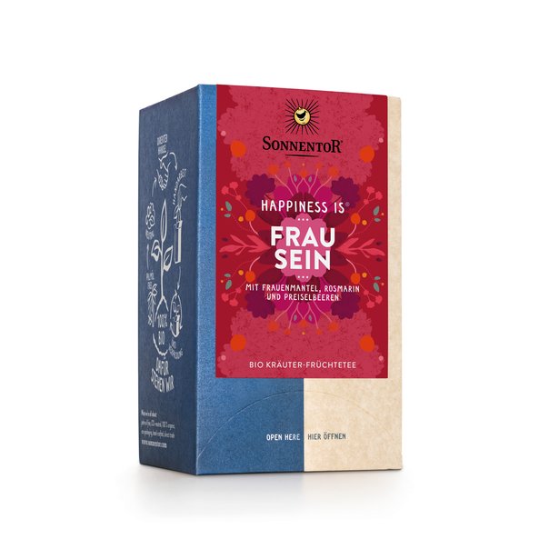 Photo of a pack Being a Woman Tea Organic Herbal Fruit Tea Blend. On the package is an illustration with floral background in red and dark red with the inscription Be a woman.