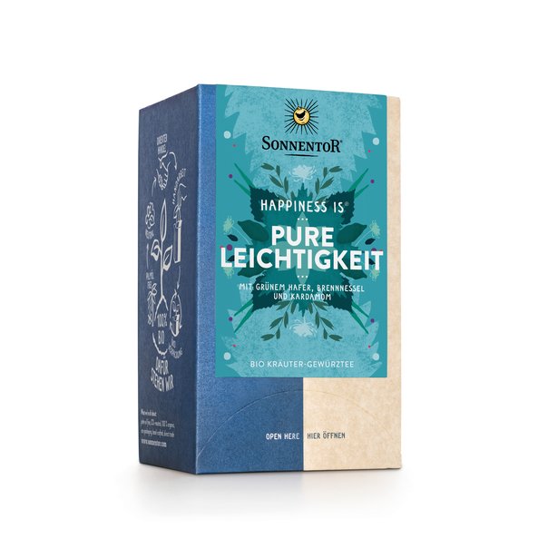 Photo of a pack Pure Lightness Tea Organic Herbal Spice Tea Blend. On the package is an illustration with floral background in light blue with the inscription Happiness is Pure Lightness Tea.