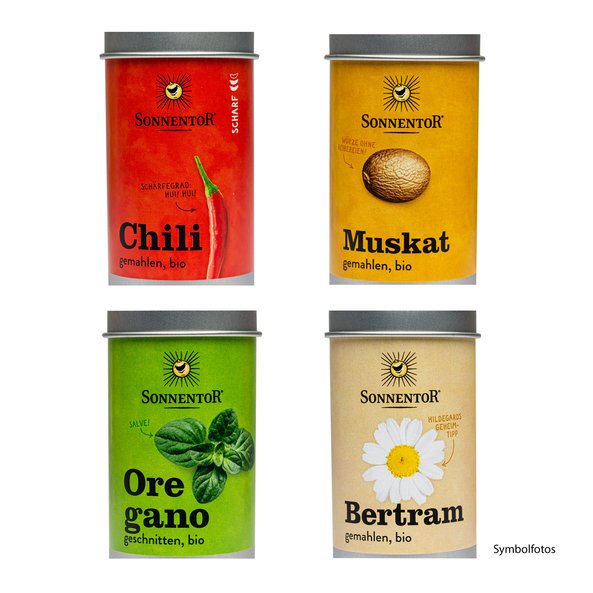 Four sprinkle cans with different labels. The labels show the spice and the name of the spice.