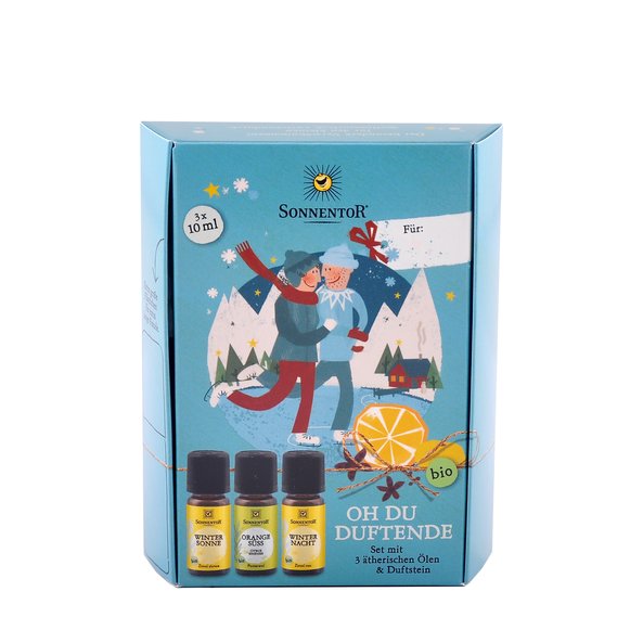 Blue gift box with a couple ice skating on it. Three essential oils and spices are also depicted on the package.