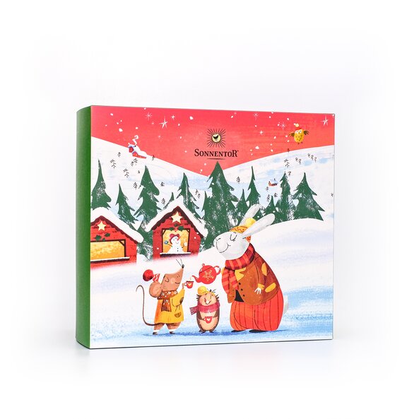 In the photo you can see the gift box Christmas. On it is a winter landscape with a bunny and a mouse depicted.