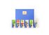 In the photo you can see a blue gift box. In front of it are six Italian spices placed.