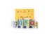 The photo shows a yellow gift box, in front of it are various Sonnentor luck products.