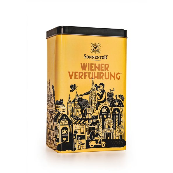 Yellow box with Viennese sights such as St. Stephen's Cathedral, Michaela Church, many buildings. Coffee grinder. It says Viennese Temptation on the tin.