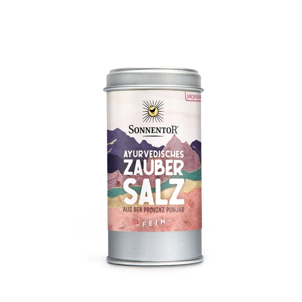 Foto einer Streudose Ayurvedisches Zaubersalz. Auf der Dose sind Berge in verschiedenen Farben zu sehen.
