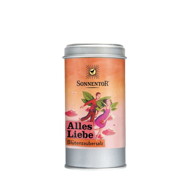 Photo of a All the Best Blossom Magic Salt. On the spice tin is a picture of a man and a woman with wings made of leaves fly next to each other hand in hand with the woman holding a heart in her hands.