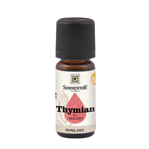 There is a bottle with a reddish drop that says thyme on it.