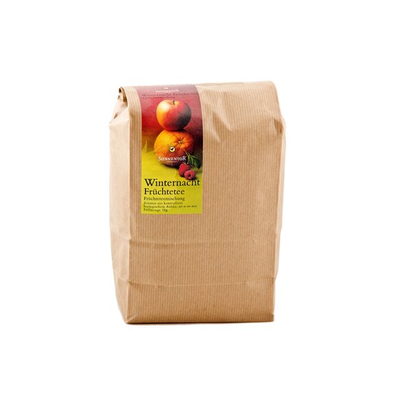 Photo of a giant-size pack winter night tea. On the package you can see an apple, orange and raspberries.
