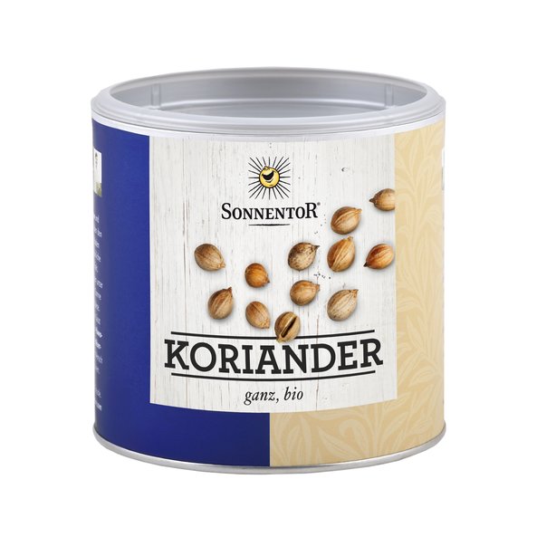 A photo of a small jumbo spice tin of coriander whole. On the are shown coriander seeds depicted.