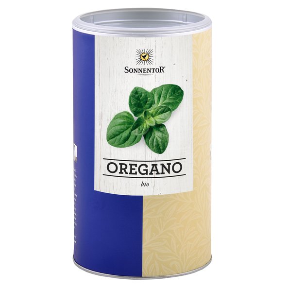A photo of a big jumbo spice tin of cut oregano. On the tin you can see fresh oregano.
