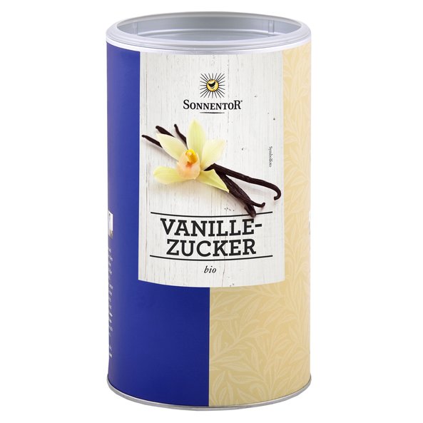 Photo of a big jumbo spice tin of vanilla sugar. On the tin are vanilla beans and vanilla flowers depicted.