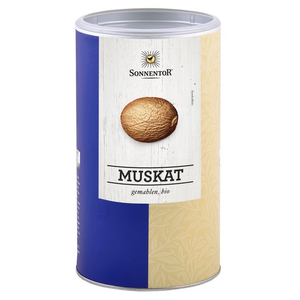 A photo of a big jumbo spice tin of ground nutmeg. On the tin you can see a nutmeg.