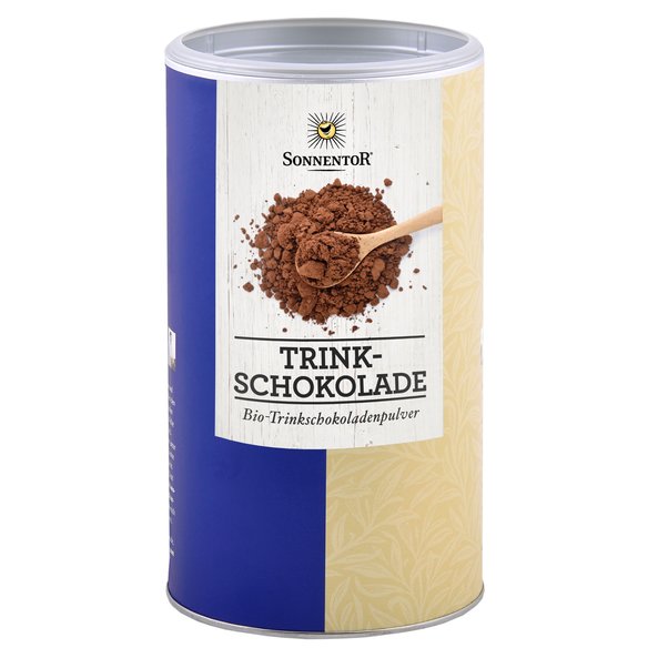 Photo of a big jumbo spice tin drinking chocolate. On the tin is drinking chocolate powder and a wooden spoon depicted.