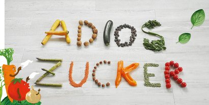 Auf dem Foto sieht man die Worte Adios Zucker aus buntem Gemüse gelegt.  | © SONNENTOR